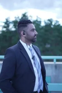Professional executive security guard in a suit providing personal protection
