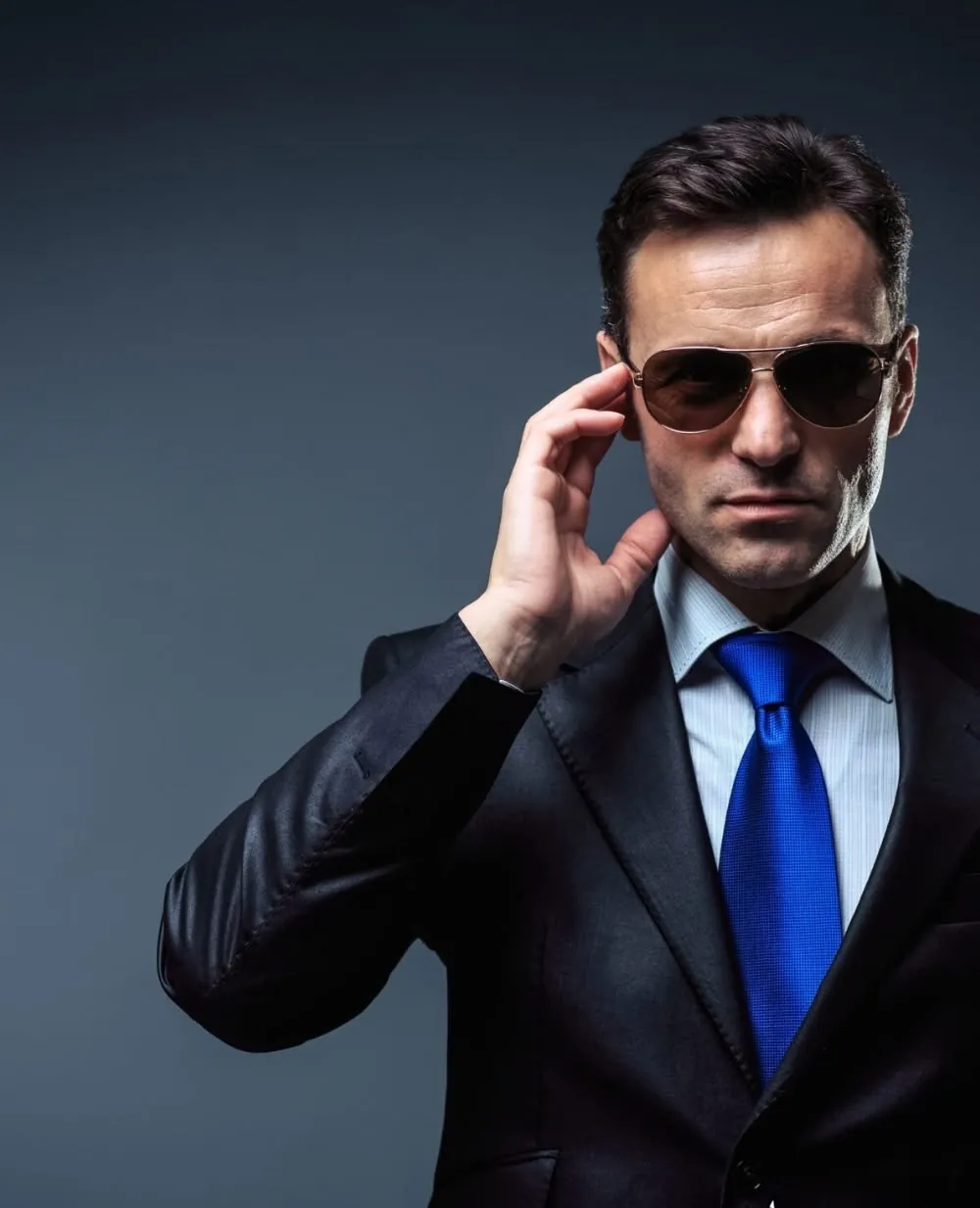 Professional executive bodyguard providing discreet protection