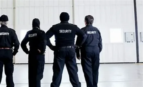 Security guards maintaining restaurant safety